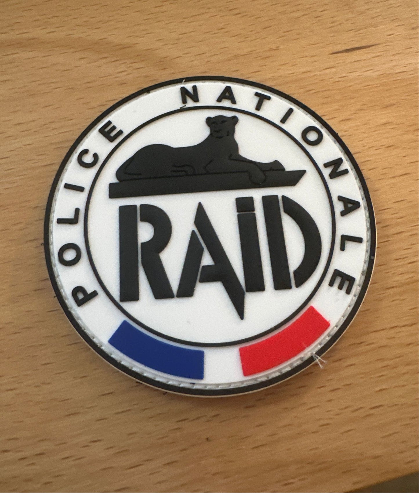Patch RAID officiel bleu-blan-rouge (PVC)