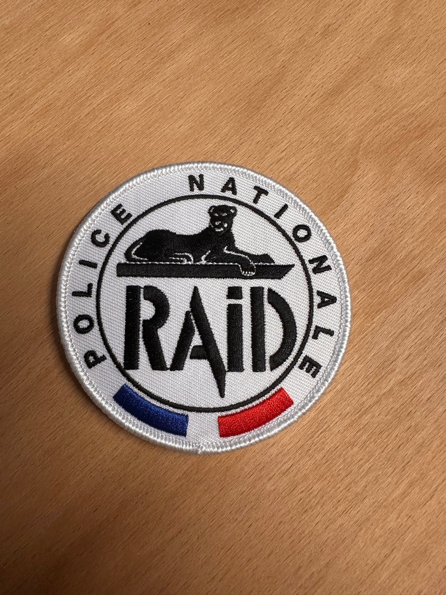 Patch RAID officiel bleu-blan-rouge (Brodé)