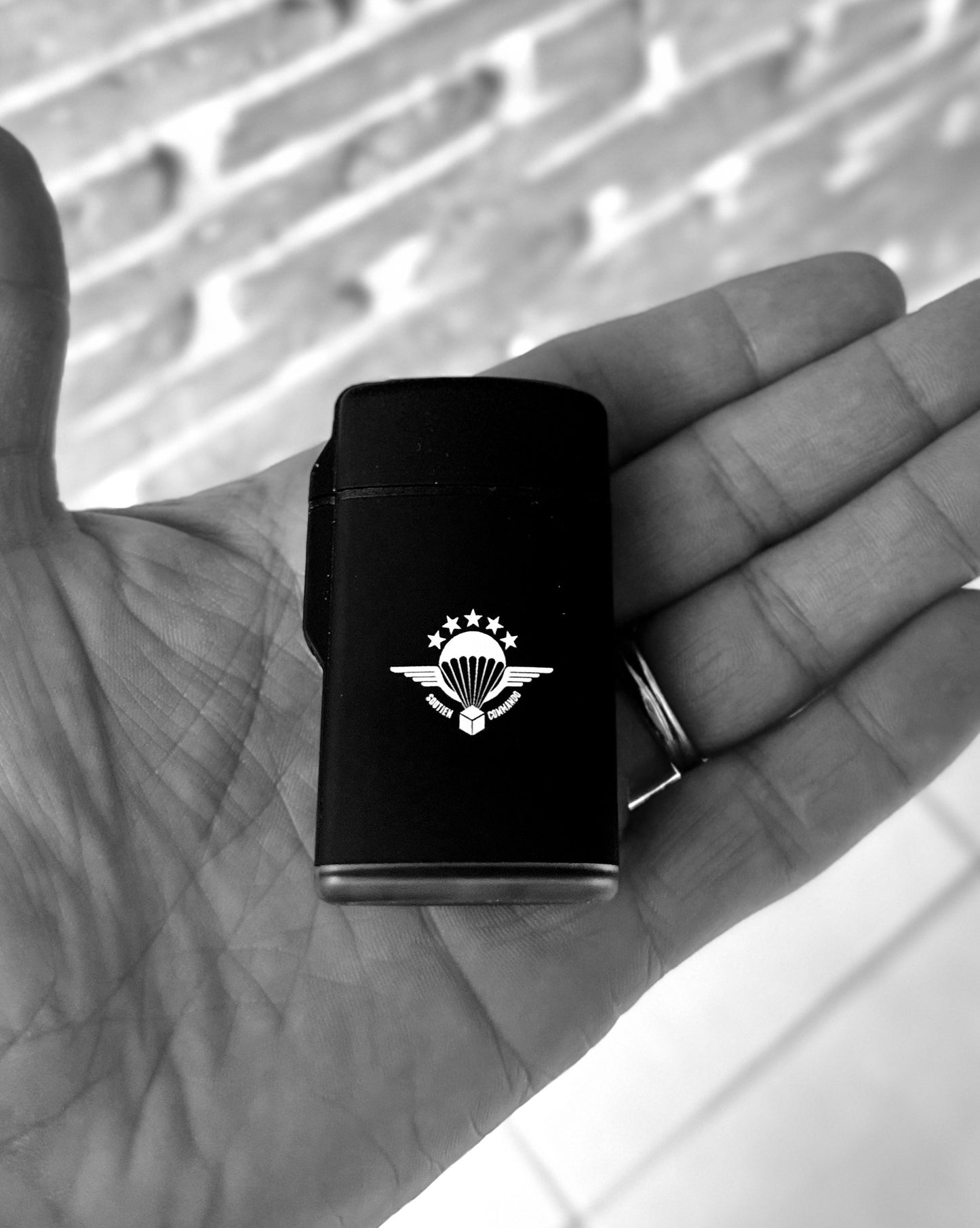 Briquet tempête Soutien Commando